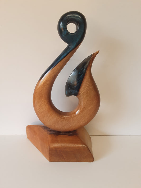Hei matau sculpture with resin