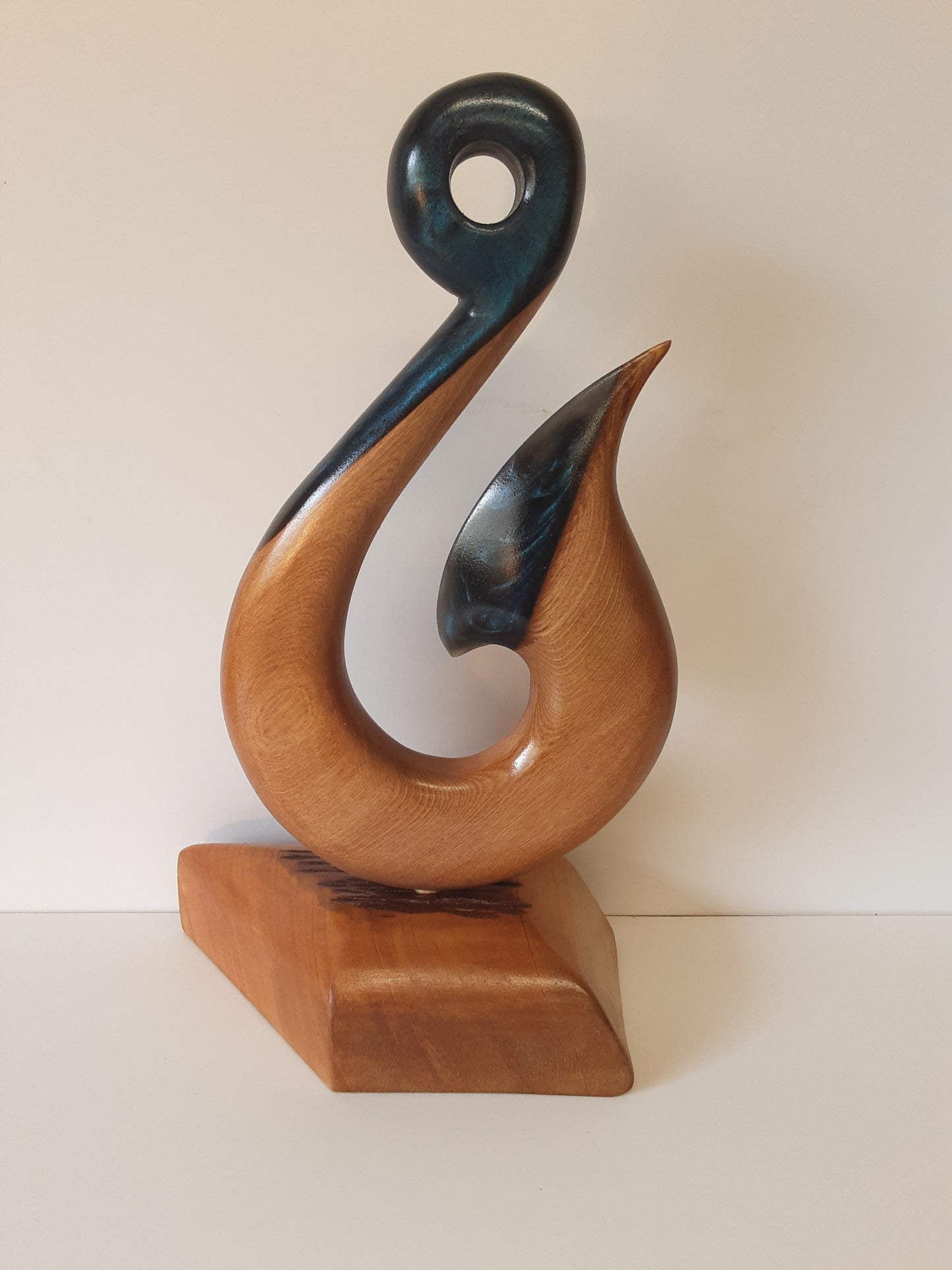 Hei matau sculpture with resin