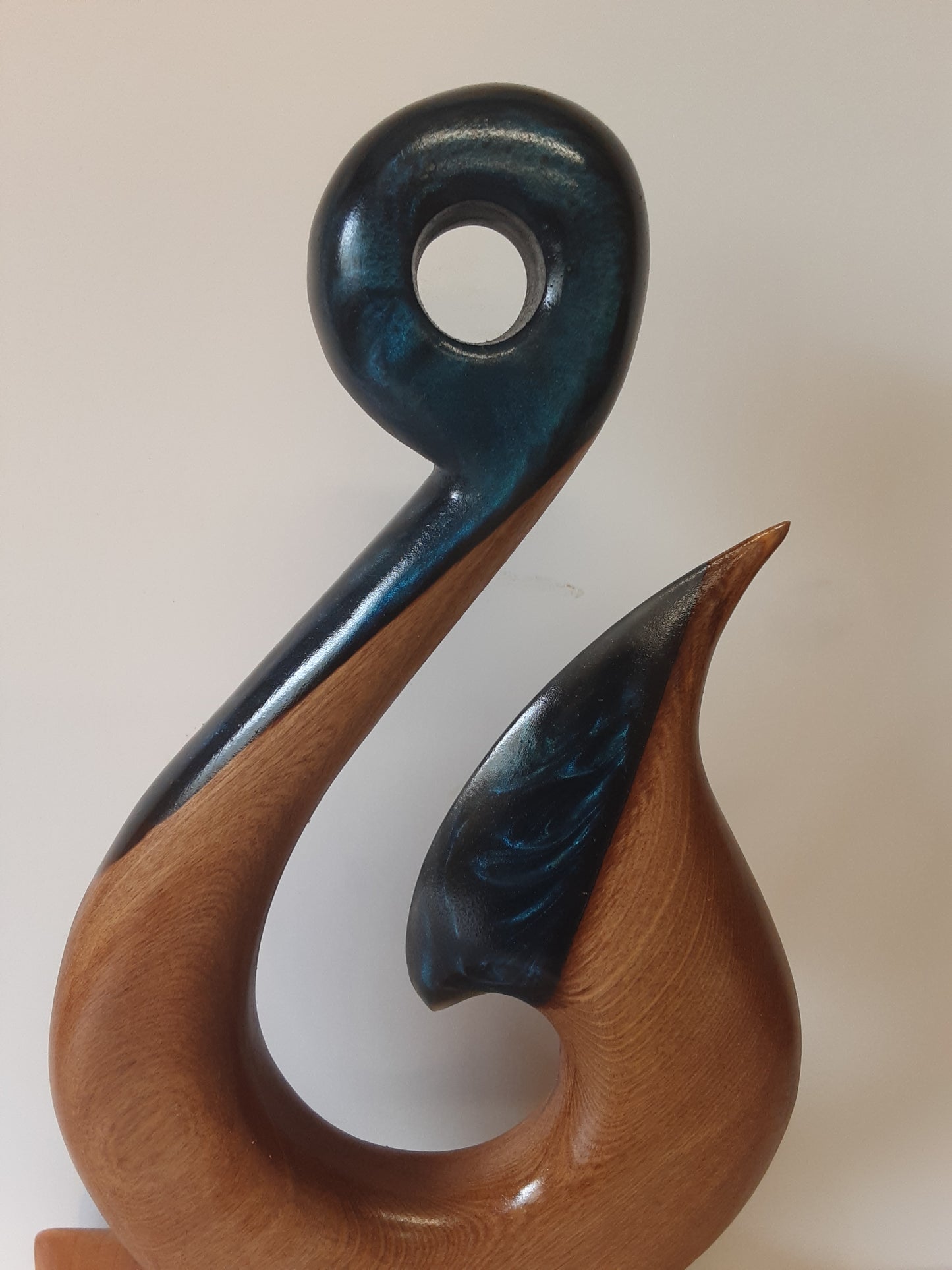 Hei matau sculpture with resin