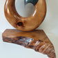 Kauri and resin hei matau sculpture